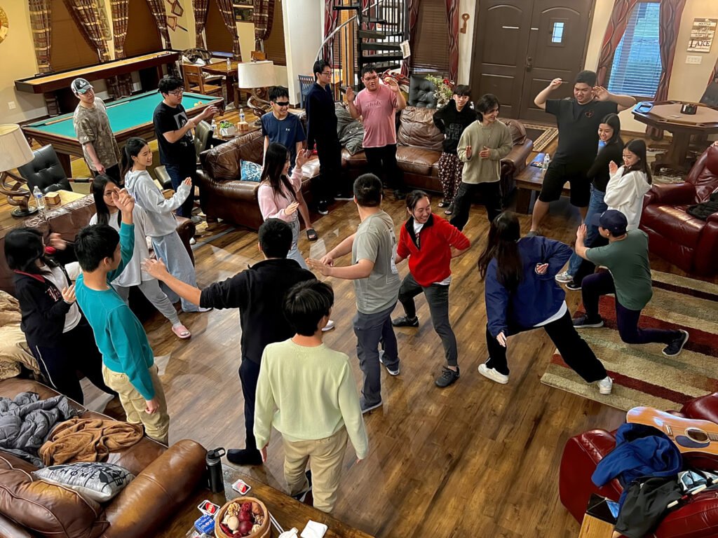 Students playing a group game at a retreat